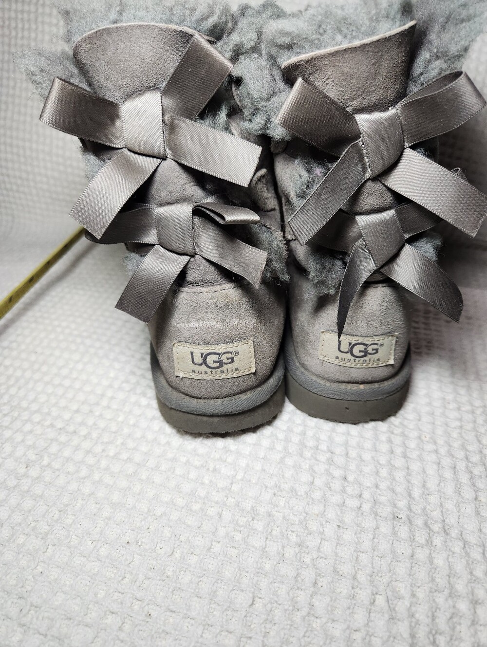 UGG Gray Bow Back Shearling Boots Flawed